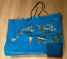 Jane Norman String Handle