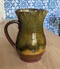 Wattisfield Ware Suffolk Studio Terracotta Jug With A Green Marble Glaze.