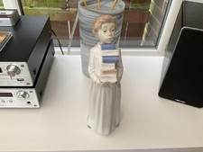 NAO BOY WITH BOOKS FIGURINE EXCELLENT CONDITION 