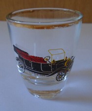 SMALL VODKA / WHISKY SHOT GLASS WITH FORD VINTAGE CAR DESIGN - VERY GOOD COND.