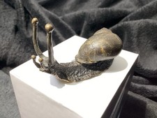 A small handmade solid bronze