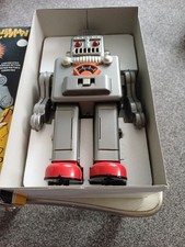 Smoking spaceman Tin Robot Collectable Toy. Vintage style Haha reproduction