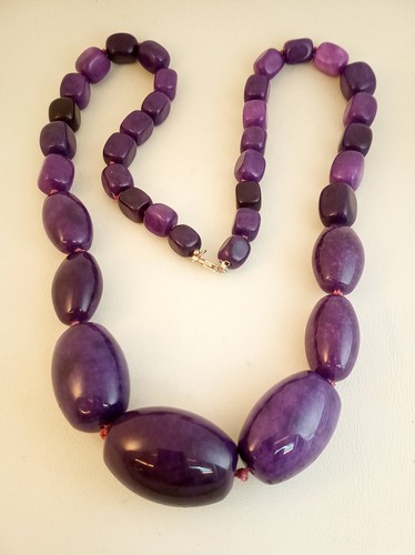 Artisan purple sugilite hand