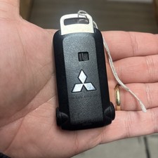 GENUINE USED MITSUBISHI 4 BUTTON SMART REMOTE KEY FOB G8D-644M-KEY-E 4M-3