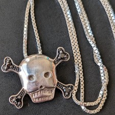 Sterling silver skull cross