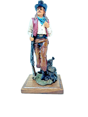 Cowboy statue holding rifle - statue,