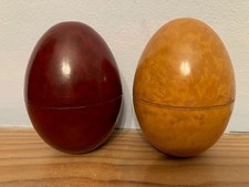 Four Bakelite/early plastic egg cups