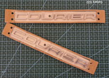 NEW GENUINE FORD COURIER REAR DOOR VAN BADGE EMBLEM LOGO FORD TRANSIT  1835930