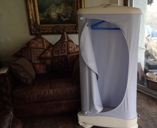 Whirpool  Stand Up Clothes Dryer/Steamer/Fabric Freshener R100 Model AWR213