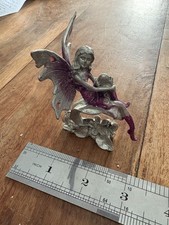 Pink And Purple Pewter Sitting