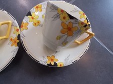 CROWN DUCAL TWO CUPS SAUCERS IN SUNBURST DESIGN