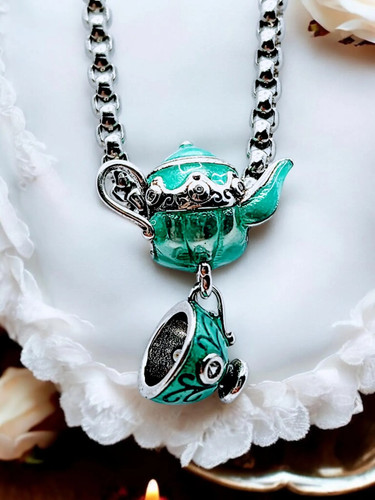 Teal enamel teapot - enamel,