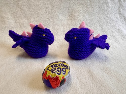 Hand knitted dragon creme - hand,