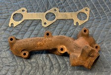 Used LEFT EXHAUST MANIFOLD -