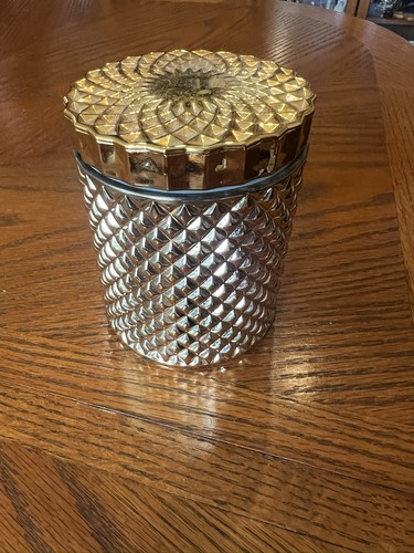 Gold coloured glass jar with - coloured,