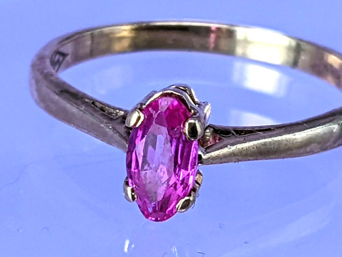Pink sapphire set into - , 9ct
