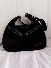 Black Storksak Baby Changing Bag. Used But Still In Good Condition. 