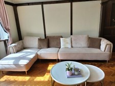 Luxury large sand colour corner sofa with buttons and brushed gold features