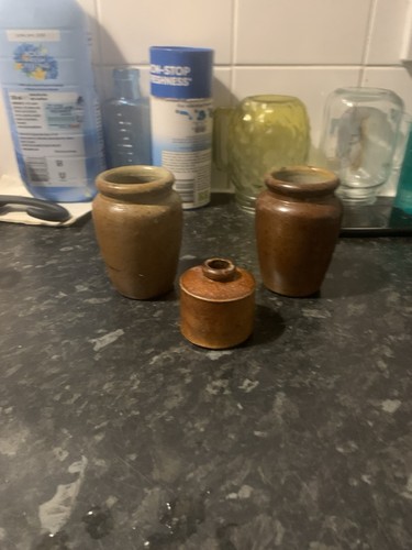Two stoneware cream pots a - cream,