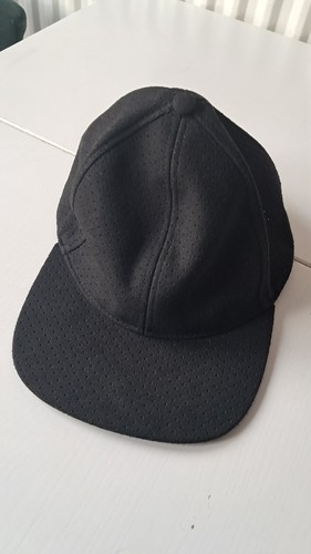 Black perforated baseball - perforated,