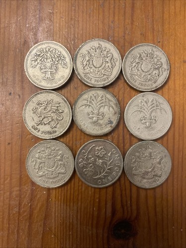 Old one pound coins round - coins,
