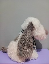 PAWS Fluffy White And Grey Dog