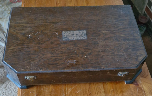Wooden hinged storage box