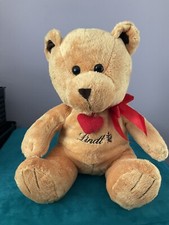 LINDT GOLDEN BEAR, HEART BOW COLLAR,  SECRET ZIP COMPARTMENT ,PLUSH SOFT TOY 11”