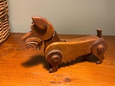 Small articulated antique wooden dog