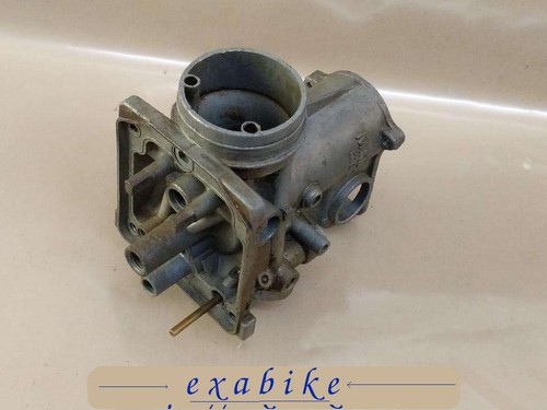 Left carburetor body - left,