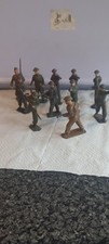 11 Metal Toy Soldiers 1950s