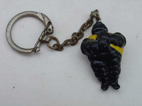 Vintage black plastic michelin - vintage,
