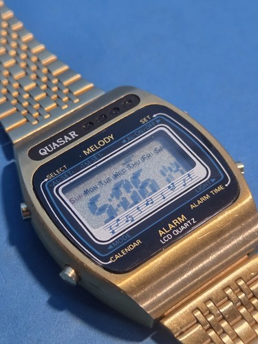 Quasar melody alarm lcd quartz - melody,