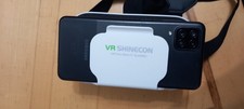 White phone vr headset by VR SHINECON works with all phones, has adjustable lens