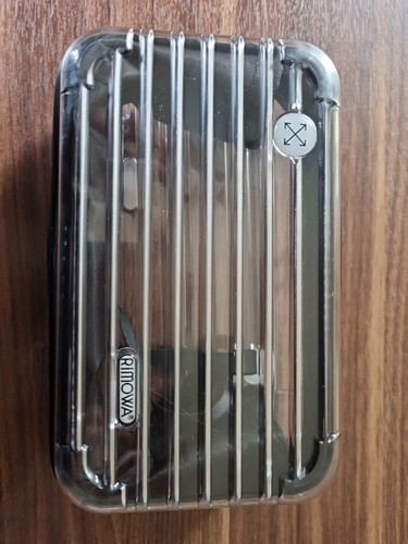 Rimowa off white luggage - x,