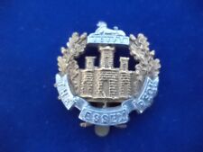 ESSEX REGIMENT CAP BADGE. EX DISPLAY CASE.