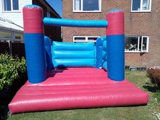bouncy castle commercial . Little used . 12ft x 12ft. Only used in our garden.