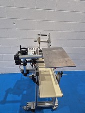 Norpak Label Applicator On Conveyor