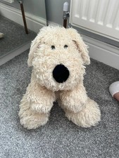 Cream fluffy soft dog cuddly