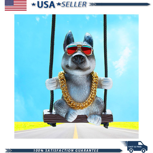 Swinging dog car hanging - swinging,