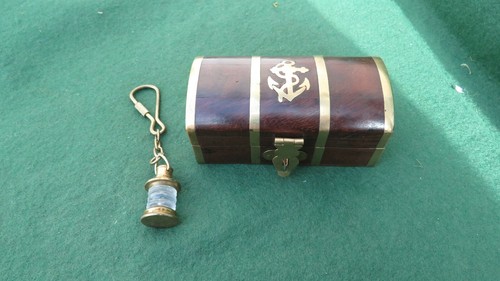 Small wooden and - small, brass