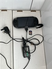 Sony PS Vita PCH-1003 Console, with Charger & LEGO Harry Potter Game Cartridge