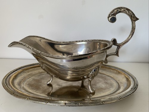 Silver plated jug and plate.