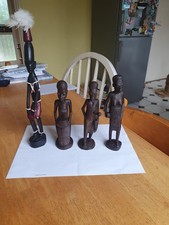 Vintage collectible group of four African figurines hand made.