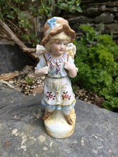 Antique Bisque Figurine Of