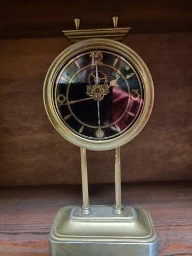 Gravity clock table - gravity,