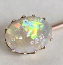 Antique 9ct Yellow Gold stickpin. Claw Set With An Iridescent Oval Opal. 