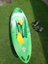 Kayak. Full Set Up.  To Include Paddle And Wheeled Carrer.  Plus Helmet. 