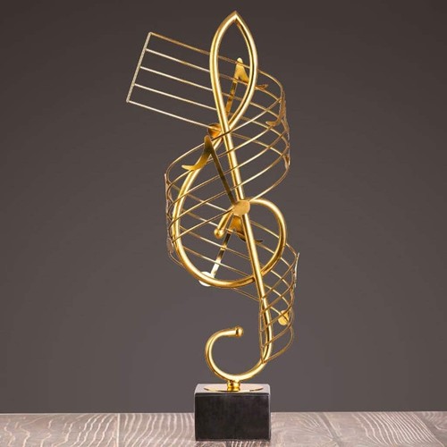 Gold musical note sculpture - musical,