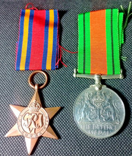 2 ORIGINAL UK MEDALS THE BURMA STAR & THE 1939-45 DEFENCE MEDAL & THEIR RIBBONS.